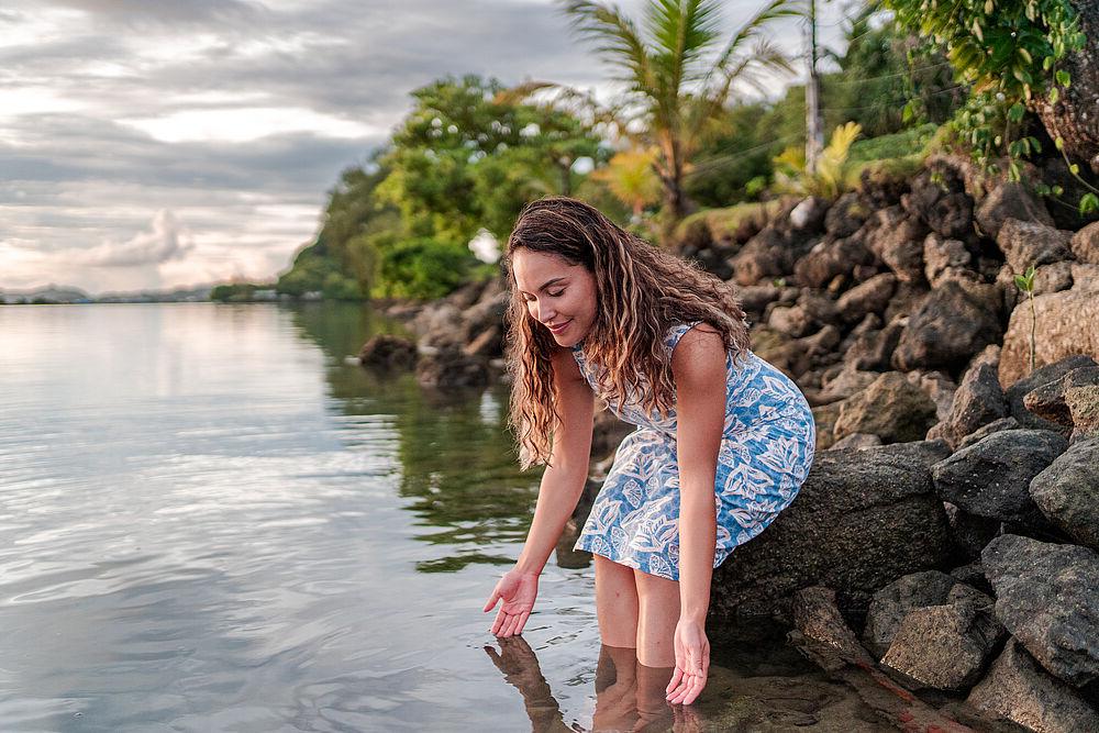 Portrait of Ivory Vogt by the ocean.